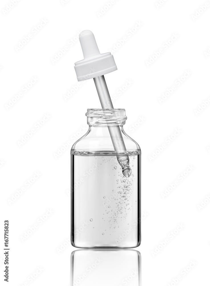 Pipette in a cosmetic bottle with liquid and bubbles, isolated on white background