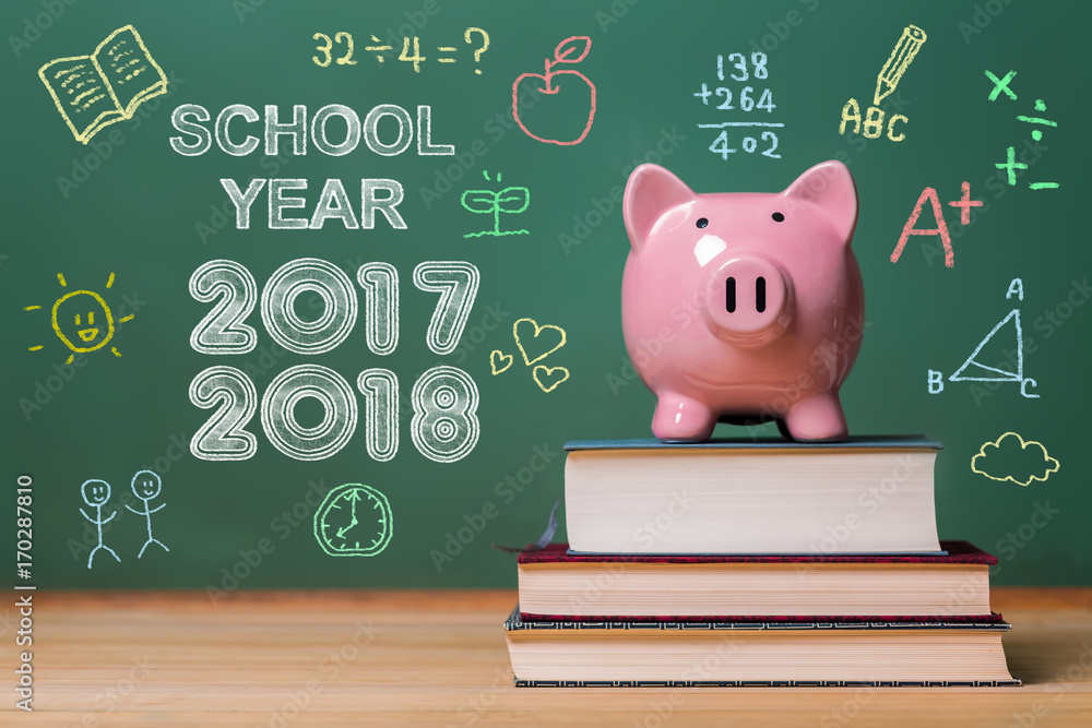 School year 2017-2018 with pink piggy bank infront of a chalkboard