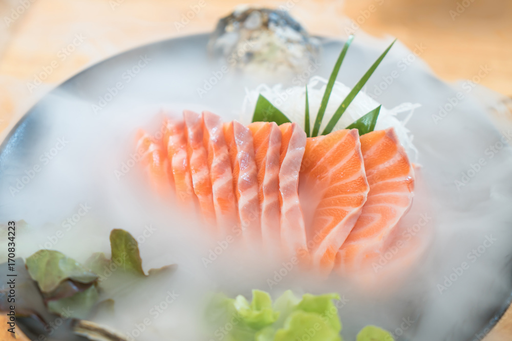 Japan raw salmon slice or salmon sashimi in Japanese style fresh serve on ice in Japanese restaurant