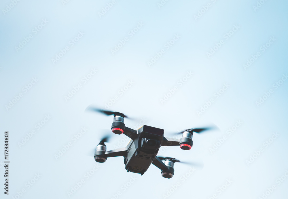 Drone flying over blue sky