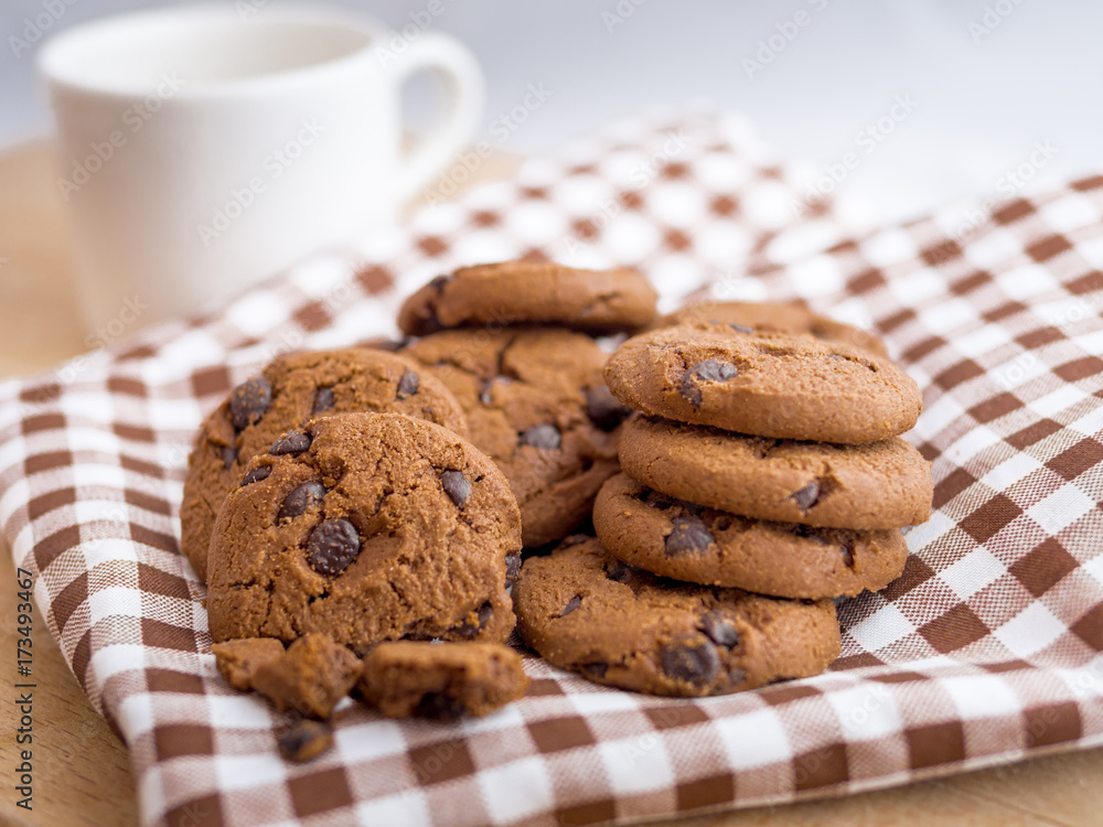Chocolate cookies on a scott fabric napkin in a dish