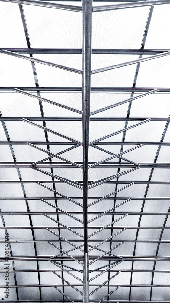 Structure of metal steel roof frame for building construction.