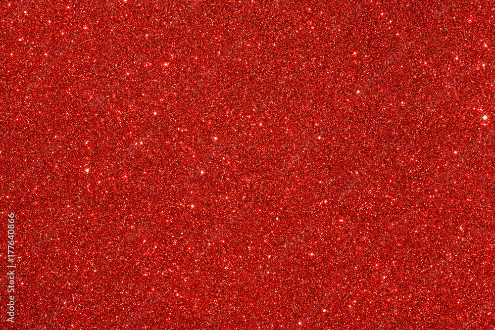 红色（红宝石）闪光背景。闪闪发光的纹理。新年或圣诞节的抽象背景
