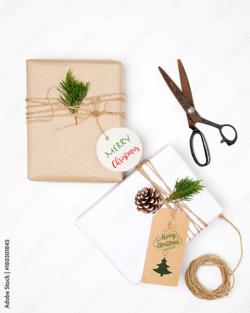 Craft and handmade present gift boxes of Christmas on white background. Creative Flat layout and top