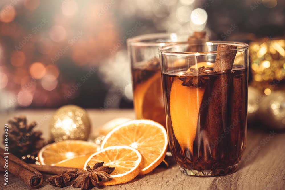 The Mulled wine in night celebration of  New Year party and delicious Christmas drink for autumn and