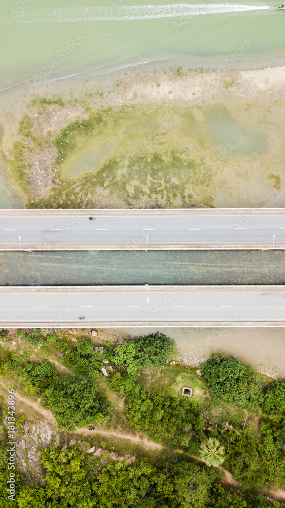 topview road street bridge pararell above the sea drone topview image background