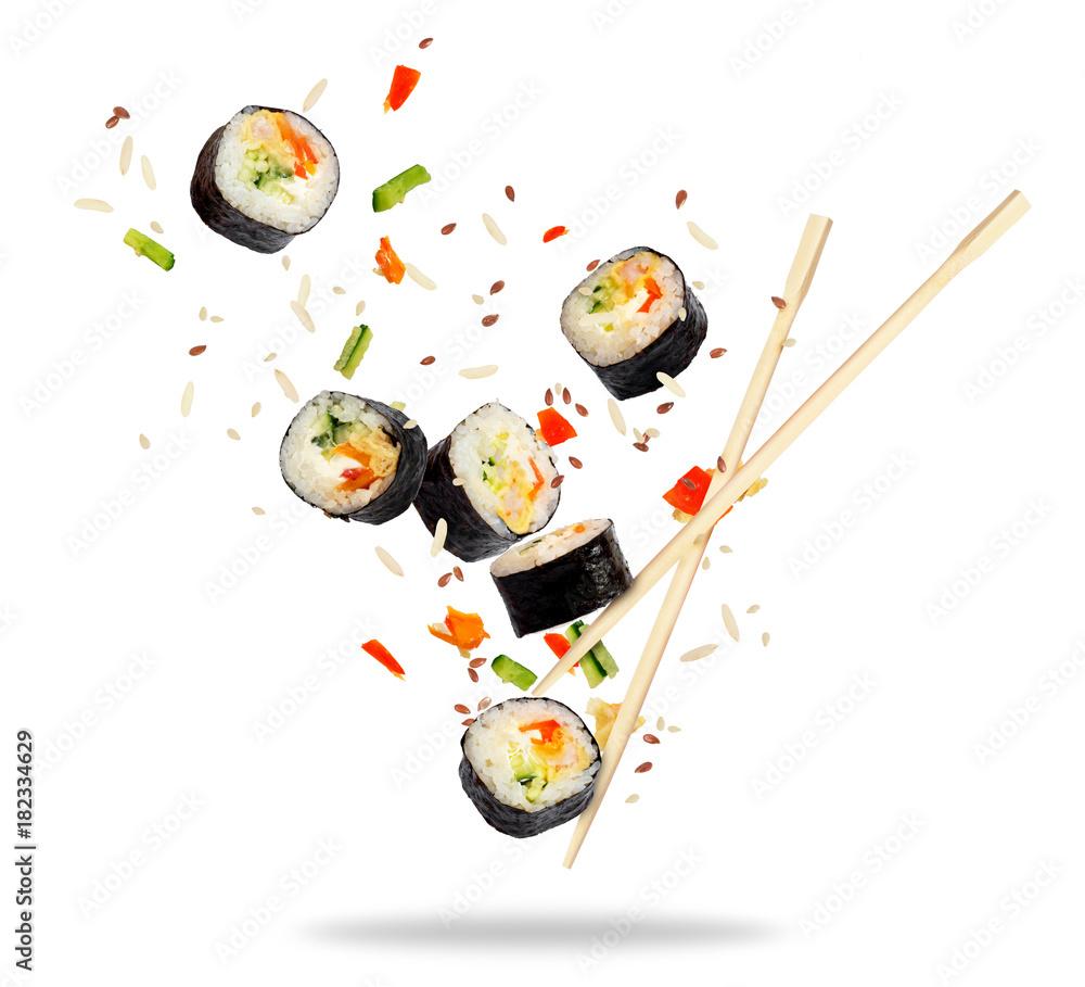 Pieces of sushi frozen in the air isolated on white background