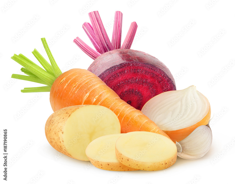 Isolated root vegetables. Cut raw potatoes, carrot, beetroot, onion and garlic isolated on white bac