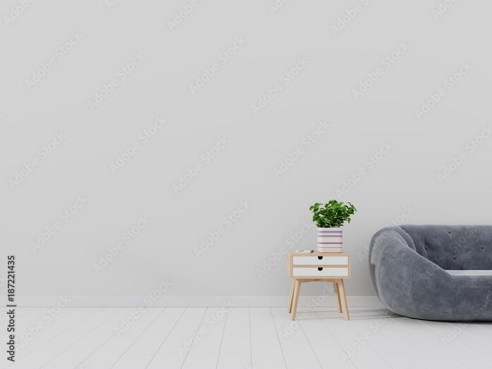 明亮舒适的现代客厅内部有沙发和白色墙壁背景的花柜