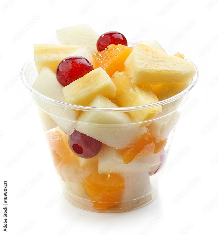 fresh fruit pieces salad in plastic cup