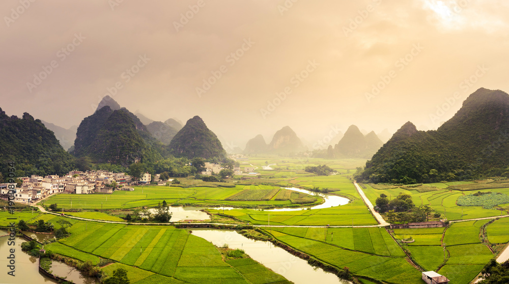 Stunning rice fields and karst formations scenery in Guangxi pro