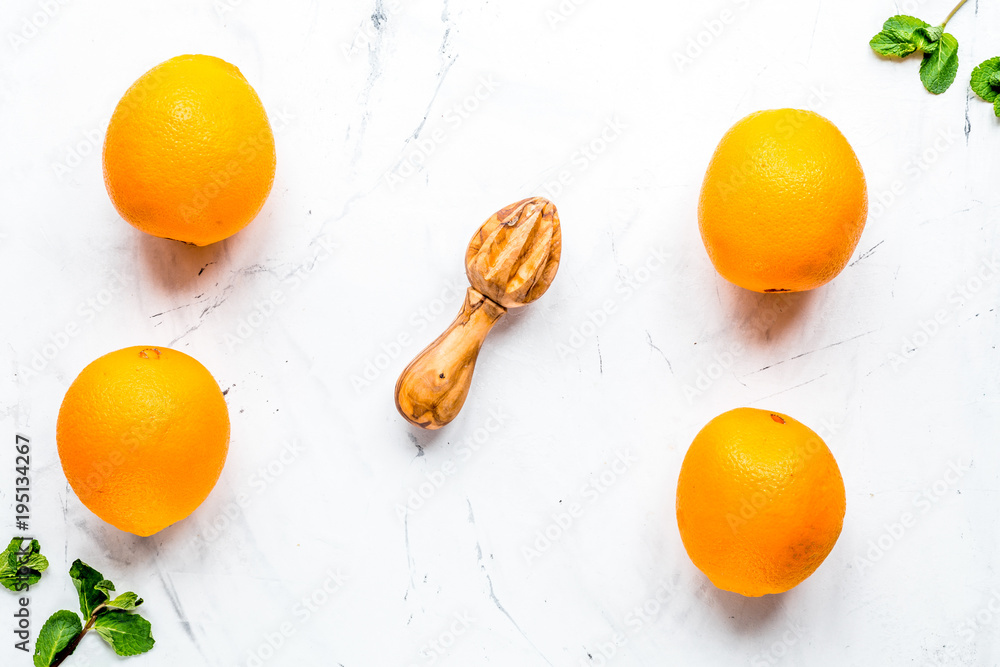 Tasty oranges for cooking smoothie on white background top view 