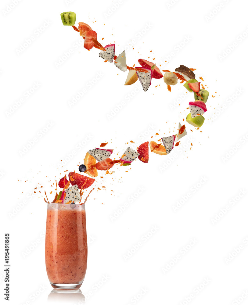 Smoothie drink with fruit flying ingredients on white