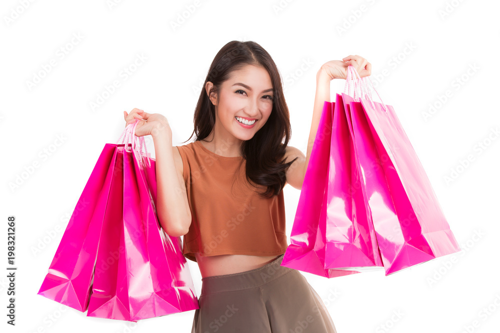 亚洲女士背着白色隔离背景的购物袋