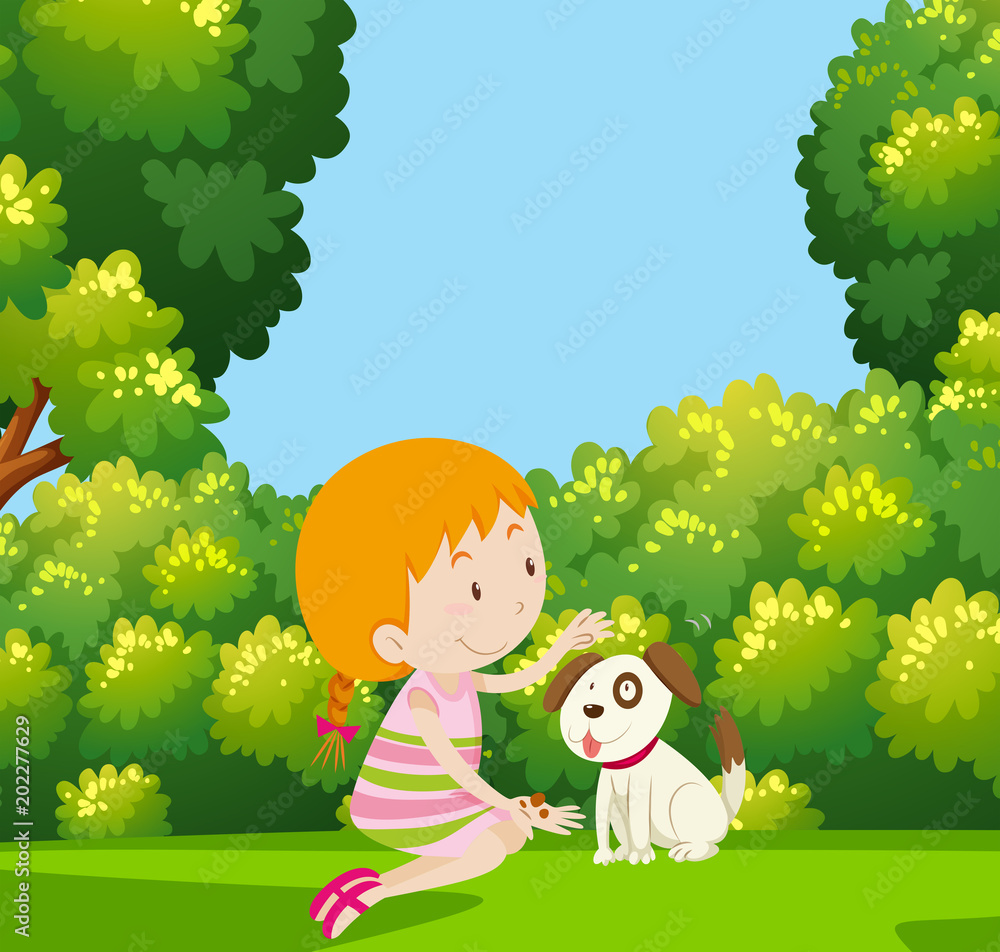 女孩在花园里和狗玩耍