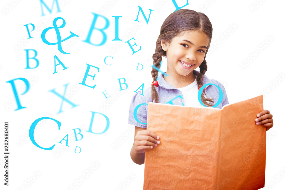 Cute pupil smiling at camera during class presentation against letters