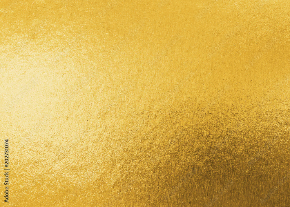 金色纹理背景金属金箔或闪亮的包装纸，用于d的亮黄色墙纸