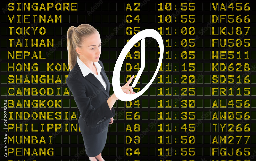 女商人指着一个白色时钟对着黑色机场登机牌的合成图像