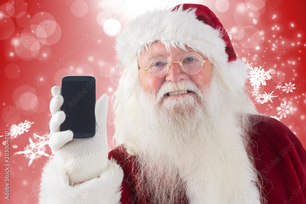 圣诞老人展示了一款智能手机，红色设计搭配白色雪花