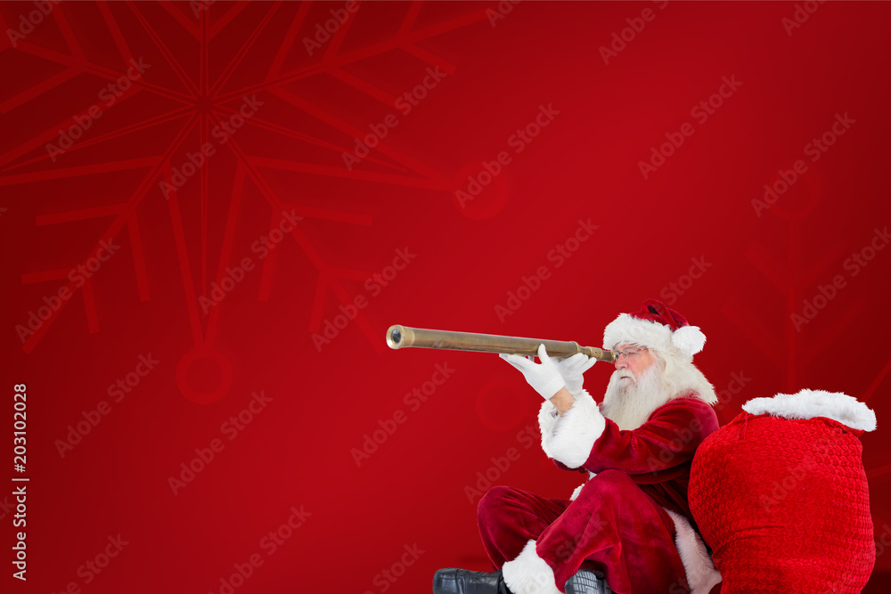 圣诞老人在红色背景下透过望远镜观看