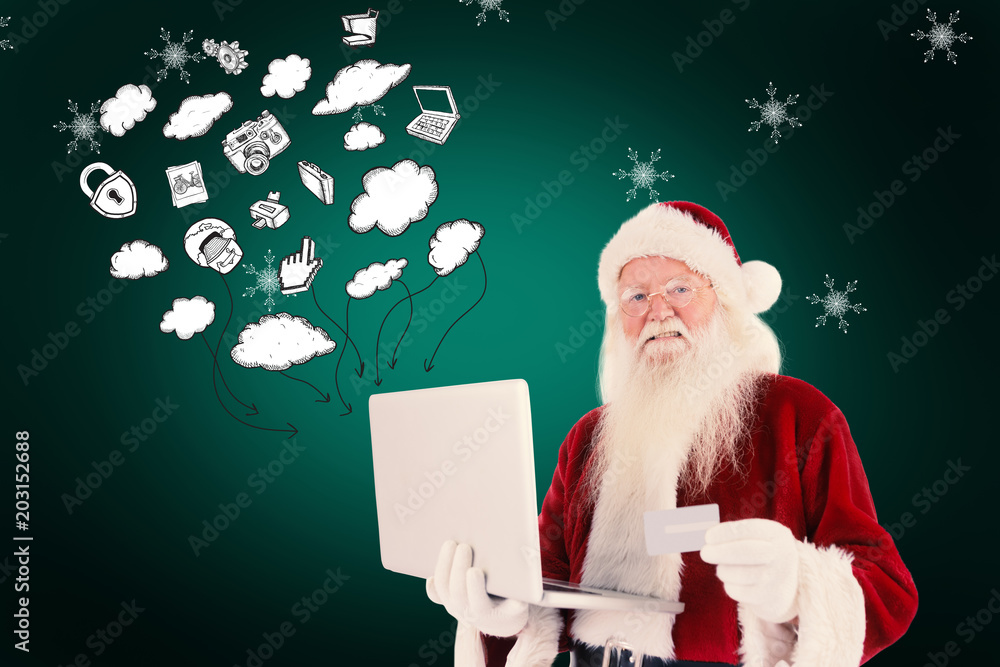 圣诞老人在笔记本电脑上用信用卡付款，背景是绿色的小插曲