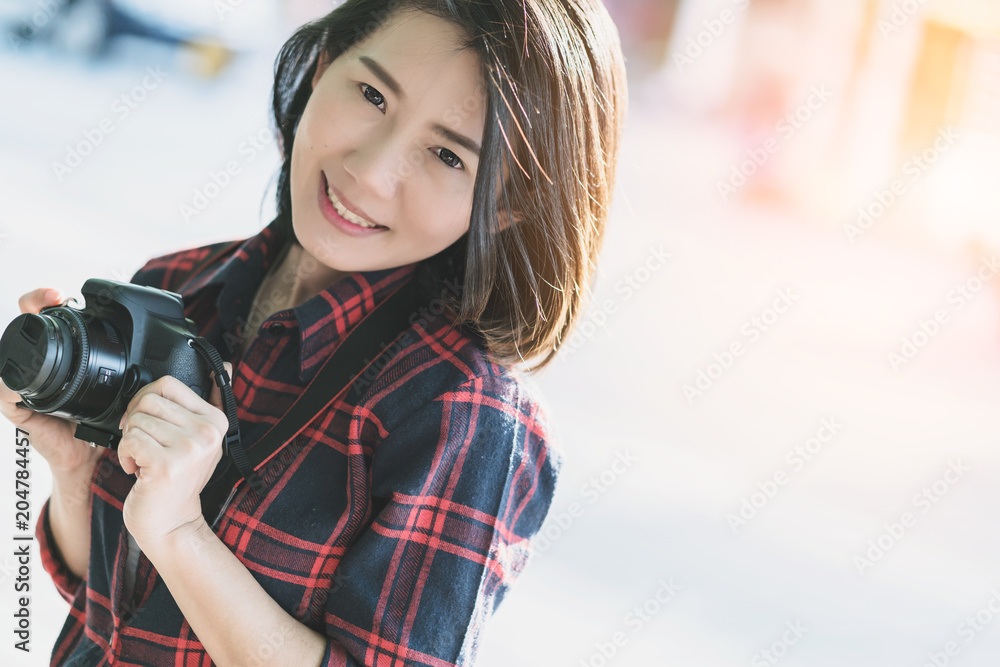 beautiful traveller asian woman smile and joyful with camera vacation trip on street sidewalk