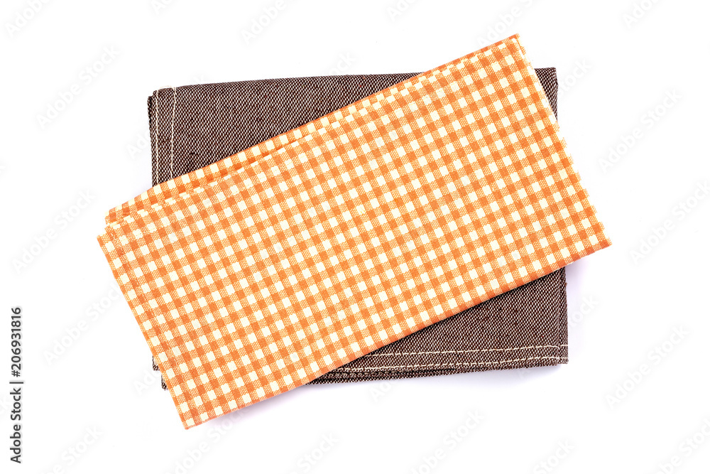 一件白底橙棕色方格餐巾桌布。