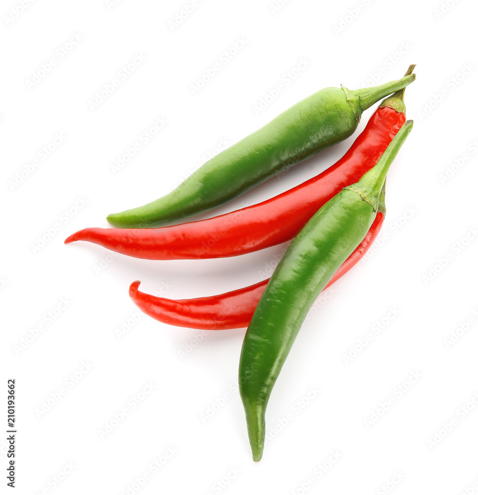 Different chili peppers on white background