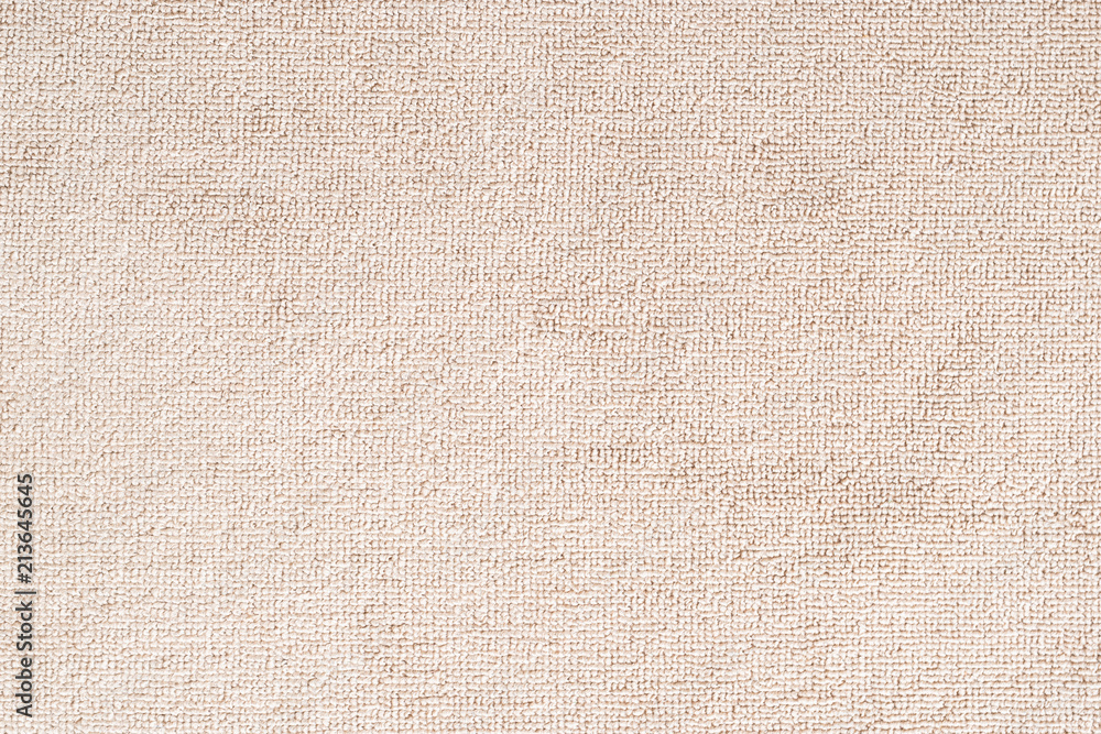 地毯地板垫或沙滩巾纹理背景，米色，由羊毛或合成纤维制成，
