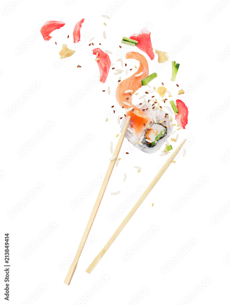 Unfolded sushi roll is sandwiched between of wooden chopsticks on white background