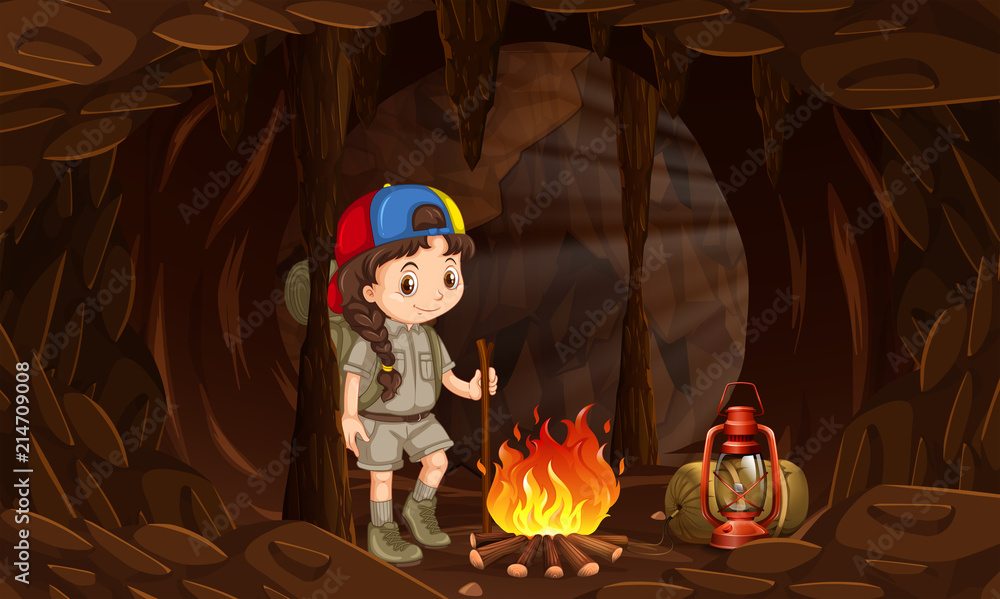 一个女孩在黑暗的洞穴里露营