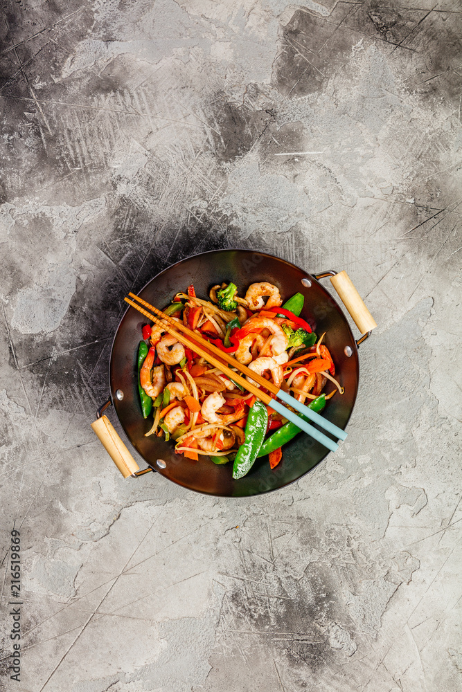 Stir fry with prawns, vegetables, soy sause and sesame
