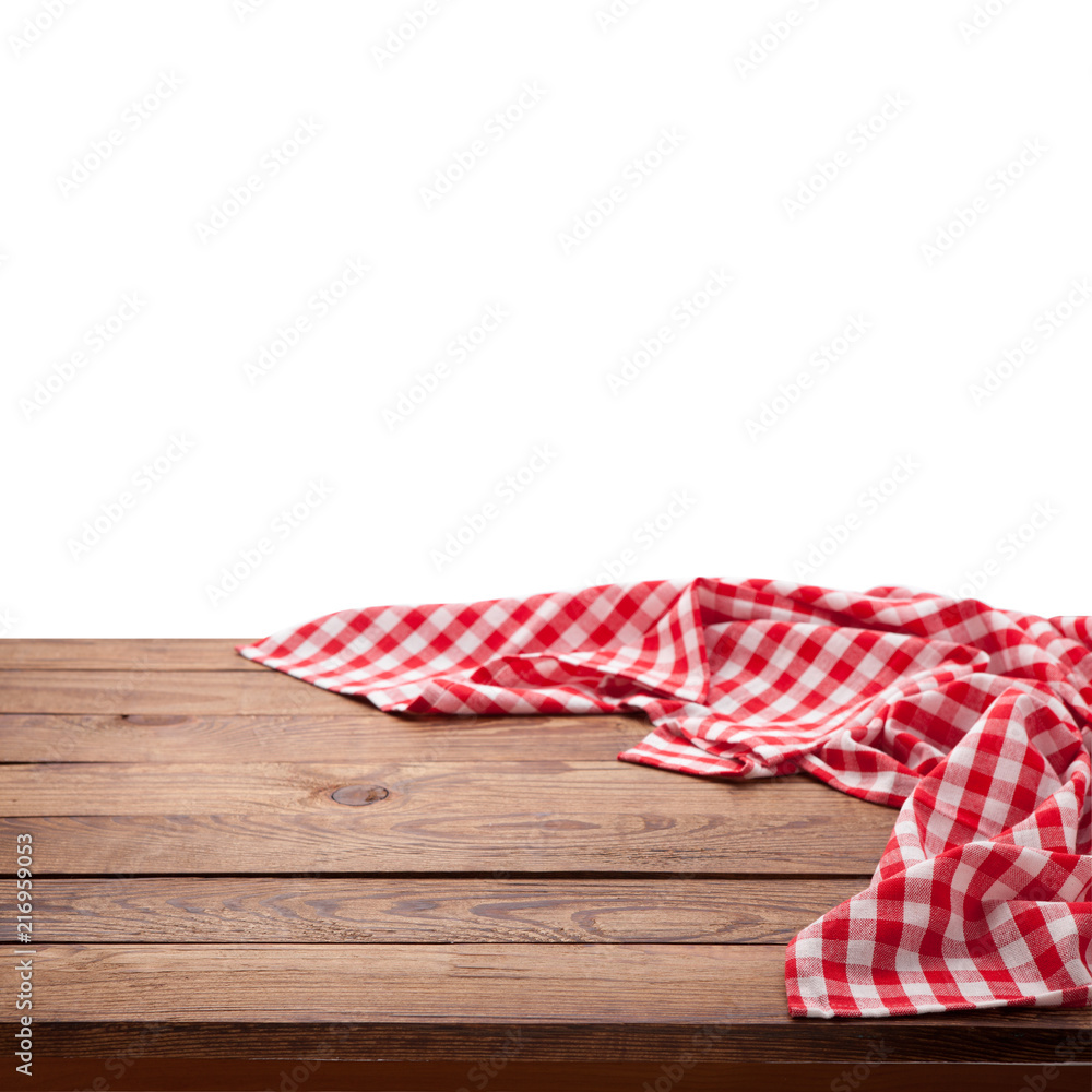 木制桌子上的红色方格桌布。餐巾特写俯视模型。厨房乡村背景