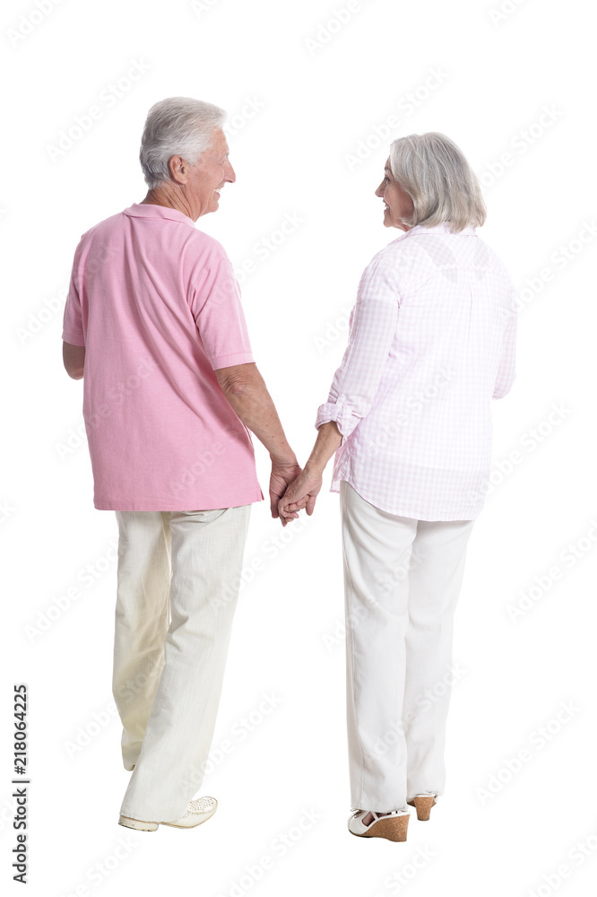 Portrait of a cute senior couple holding hands