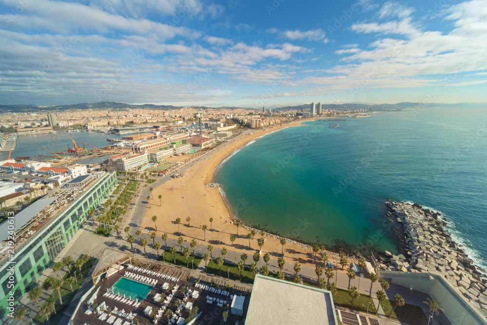 Aerial view of Barcelona Beach in summer day along seaside in Barcelona, Spain. Mediterranean Sea in