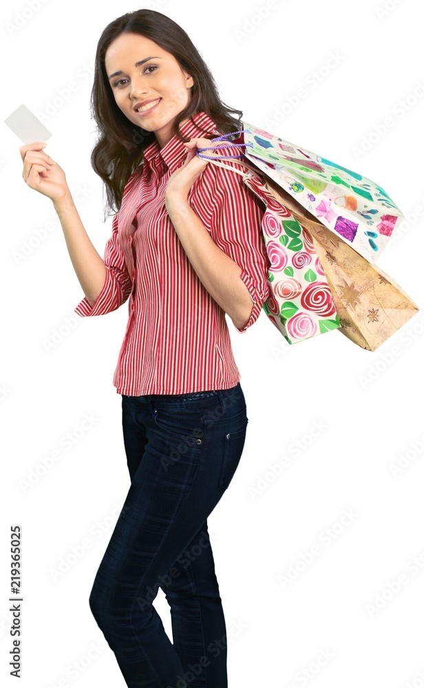 拿着购物袋的年轻女子近照