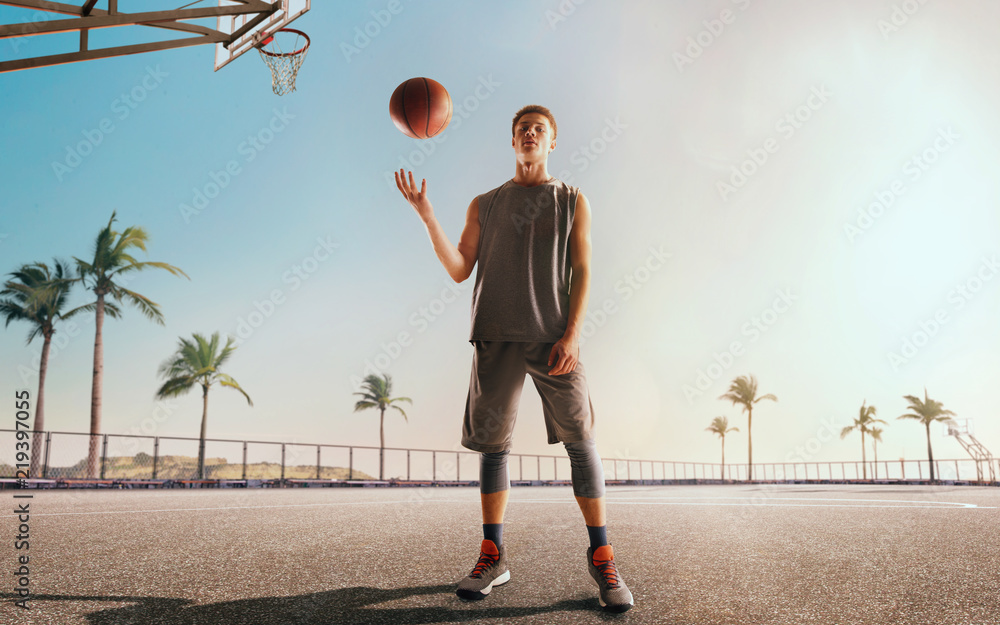 街球。日落时的篮球运动员。