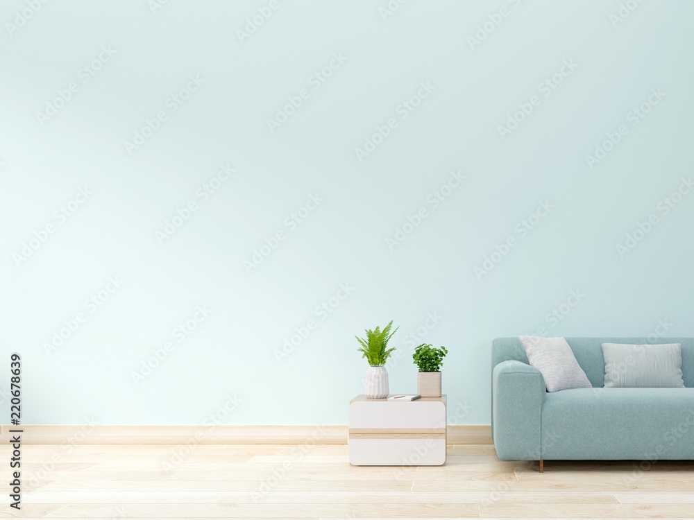 现代客厅内部，配有沙发和绿色植物、橱柜、花瓶、蓝色墙壁背景上的花朵。