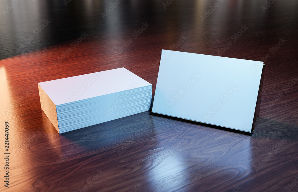 木制办公桌上的白色名片叠3D渲染