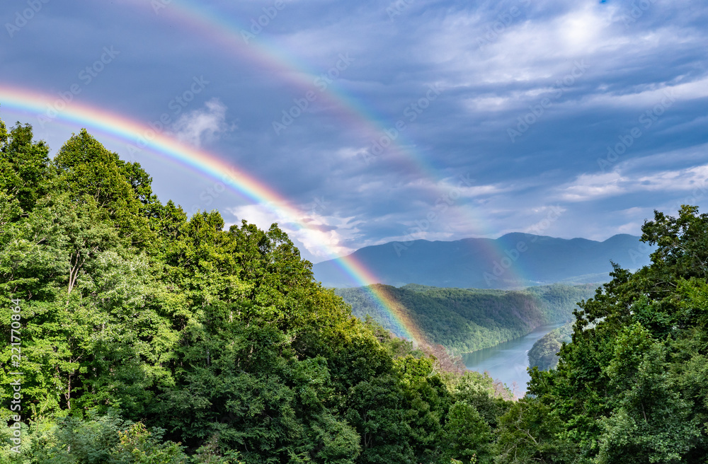 Double Rainbow in Lush Mountain Valley