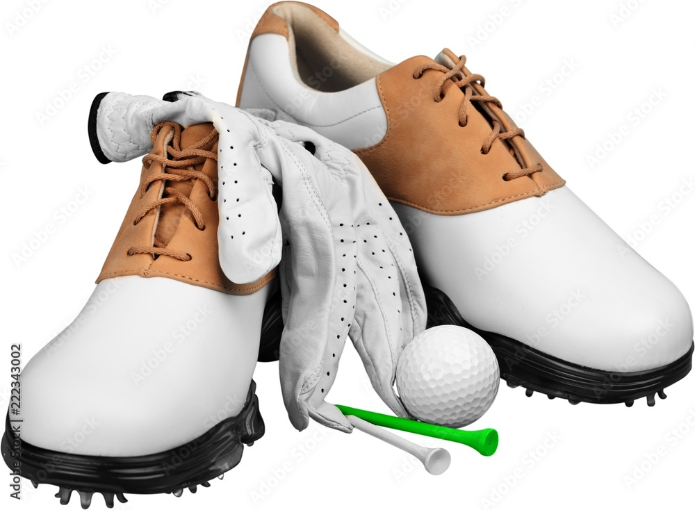 一双白色隔离的高尔夫鞋、球和球座