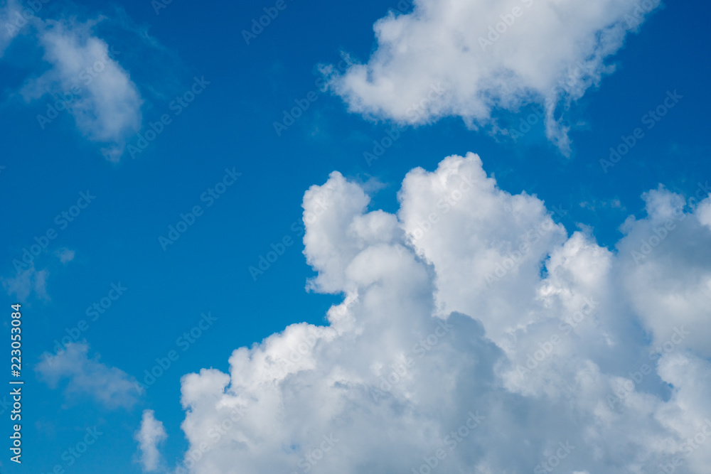 Beautiful white clouds and blue sky on a sunny day
