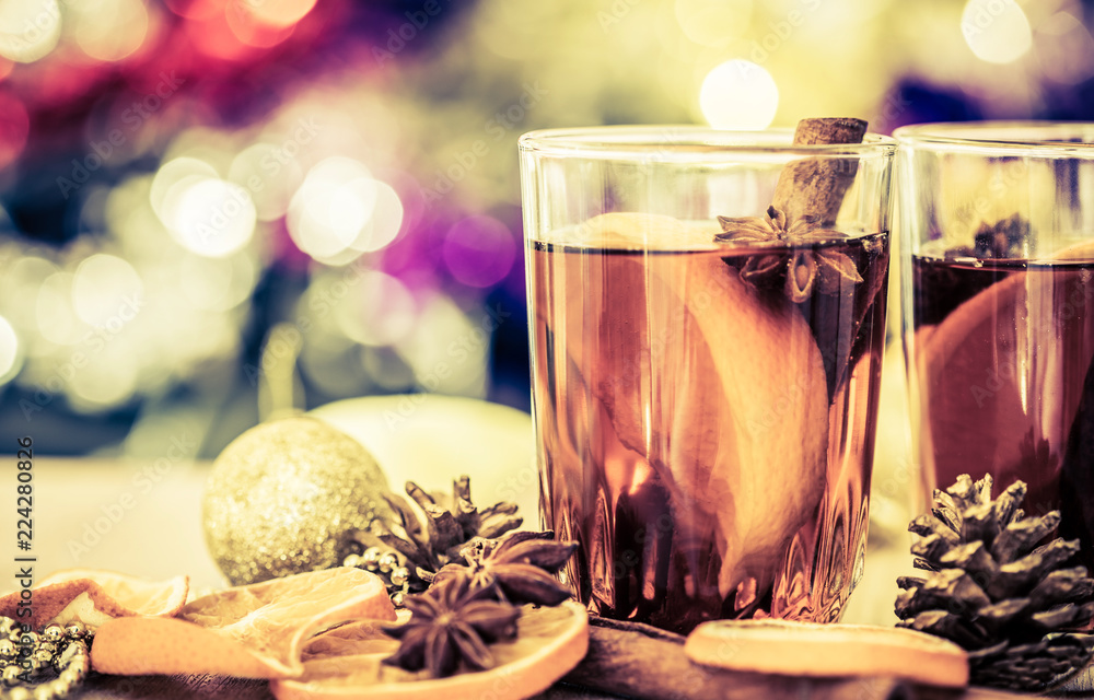 Mulled wine in night celebration of  New Year party and delicious Christmas drink for autumn and a w