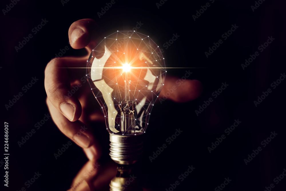 man hand choose glow light bulb creativity business ideas concept black background