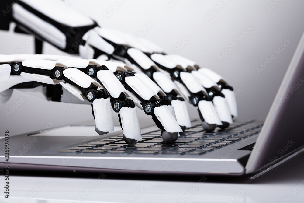 Robot Typing On Laptop Keypad