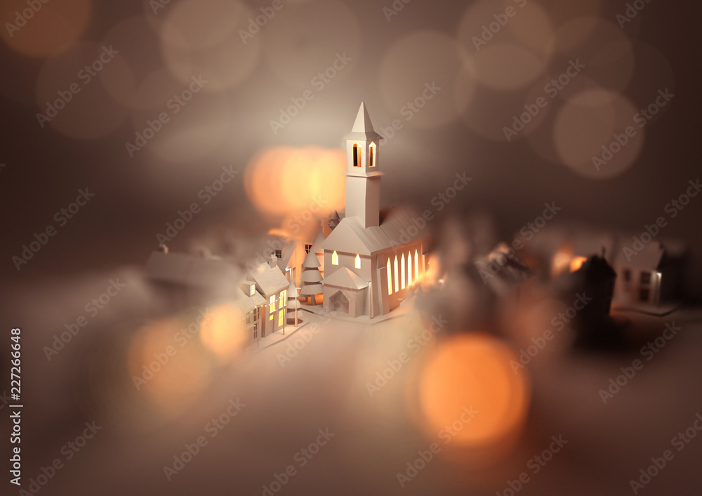 一个节日的圣诞村中心，在圣诞前夜有一座教堂，街道上的灯光和十二月