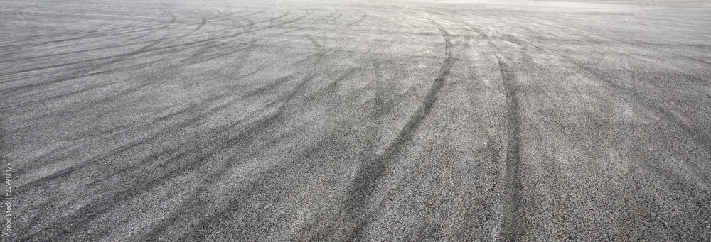 Car track asphalt pavement background at the circuit