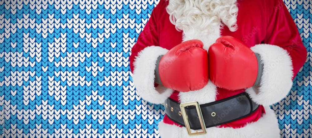 戴着拳击手套的圣诞老人中间部分的合成图像