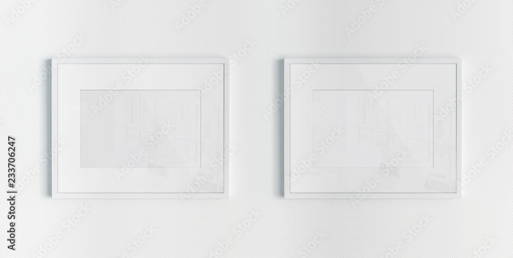 两个白色框架悬挂在白色墙壁模型上