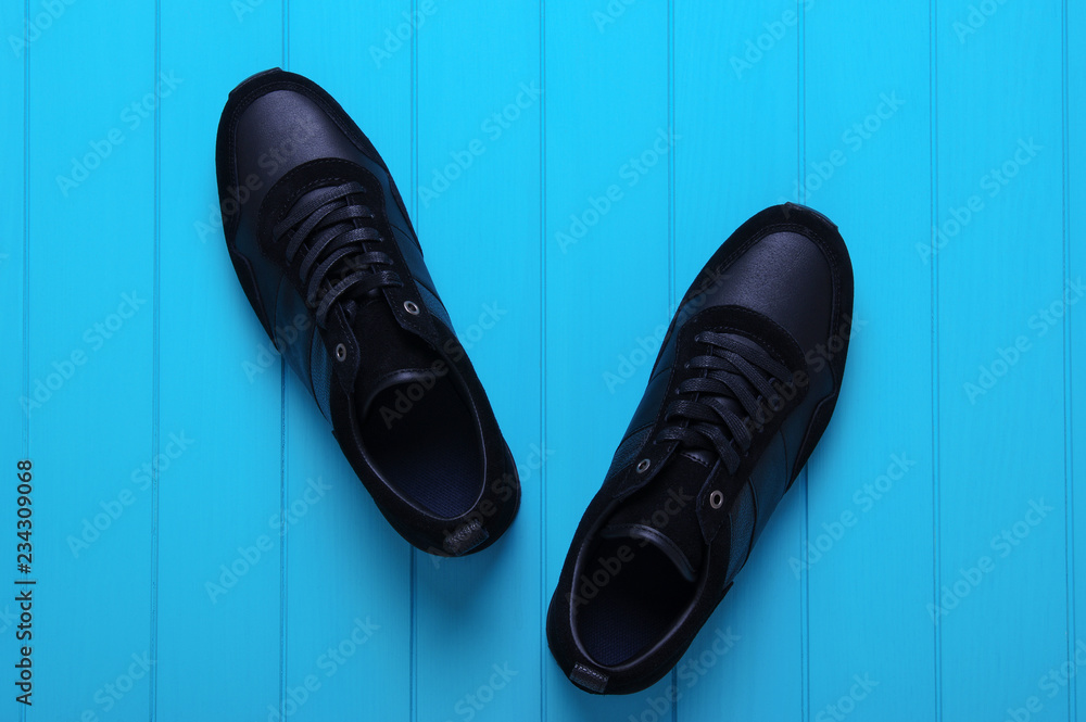 Mens sport shoes оn wood